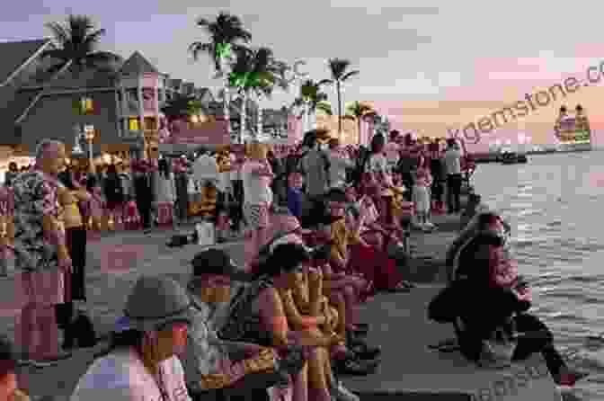 A Lively Sunset Celebration On Mallory Square, Showcasing The Vibrant Nightlife Of Key West. Key West (Images Of Modern America)