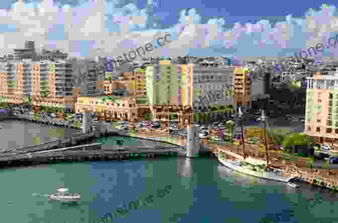 A Panoramic View Of San Juan's Iconic Skyline, Showcasing The Vibrant Colors Of Its Historic Buildings Against The Backdrop Of The Azure Caribbean Sea The Island Hopping Digital Guide To Puerto Rico Part IV The North Coast: Including Punta Borinquen Arecibo Puerto Palmas Atlas San Juan And Old San Juan