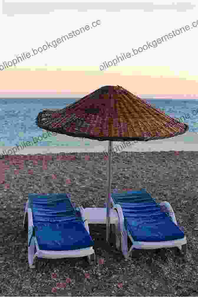 Comfortable Sunbeds And Umbrellas Arranged On The Private Beach Of Along The Shore Club Along The Shore (The Club 3)