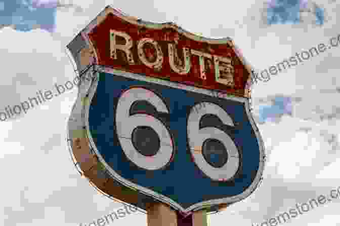 The Iconic Route 66 Sign, Illuminated With Neon Lights Against A Backdrop Of The Open Road, Symbolizing The Nostalgic Allure Of This Legendary Highway. Neon Road Trip John Barnes